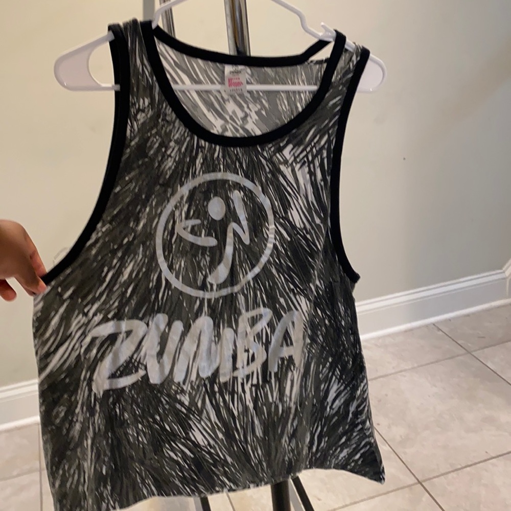 I selling a tank top. Color-black,white, grey